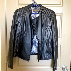 Black rivet black leather jacket